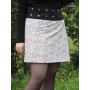Jupe blanche coupe droite coton imprimé à pois multicolore
Jupe wrap trapèze ceinture boutons pressions