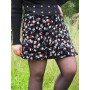 Jupe velours noir évasée coupe portefeuille imprimé fleuri, jupe habillée, jupe boutonnée, jupe trapèze