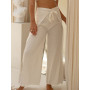 pantalon wrap blanc, pantalon portefeuille blanc, pantalon a nouer, pantalon fendue, pantalon enveloppant