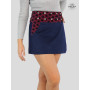 jupe courte bleue asymetrique en jean motif pois rouge