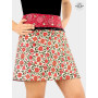 jupe rouge zippée transformable pochette détachable ceinture imprimé fleurs rouges fond beige  boutons pression